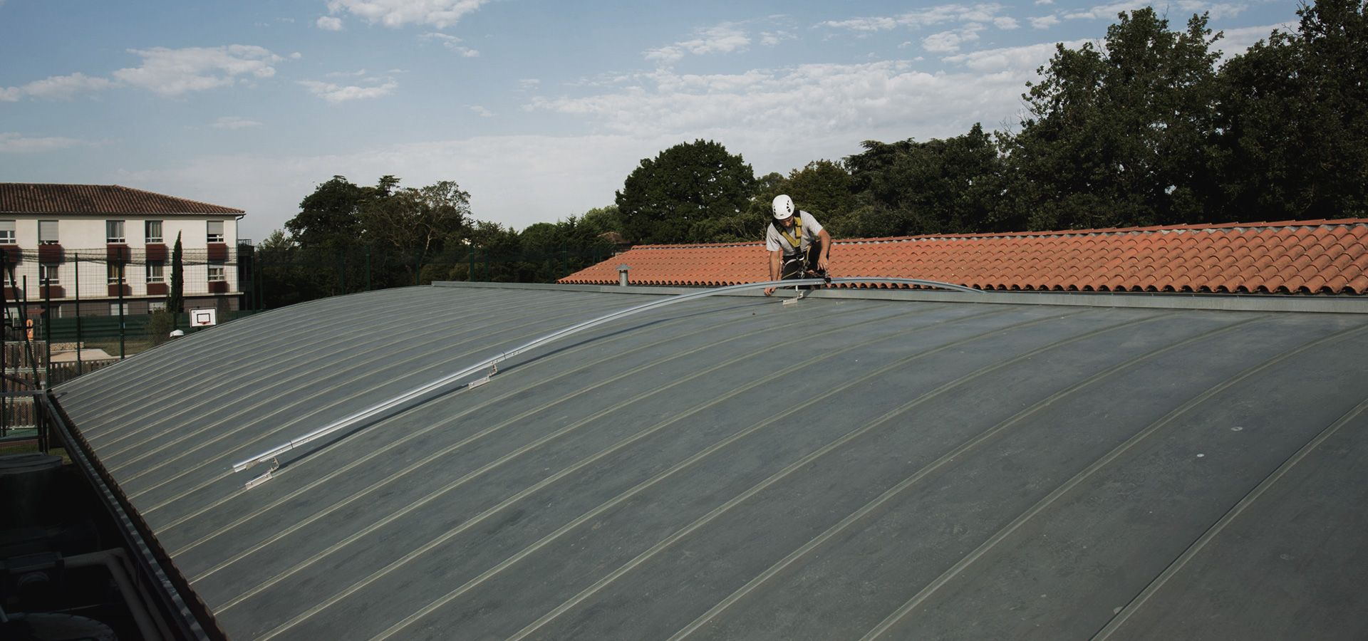 In France, a tile roof maintenance system is in use